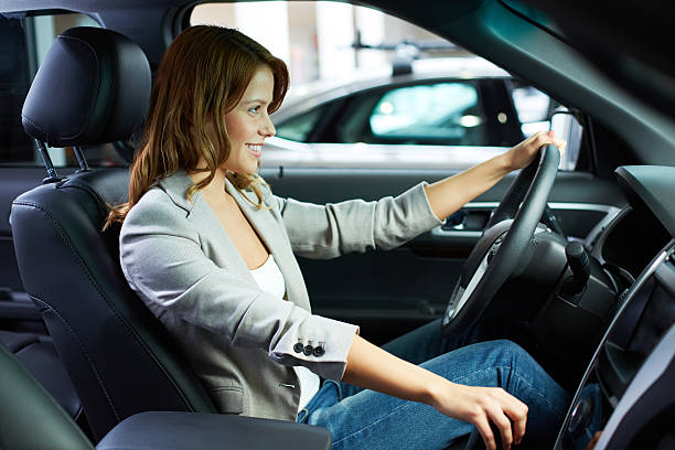 istock A woman learning how to drive in her car 180236177