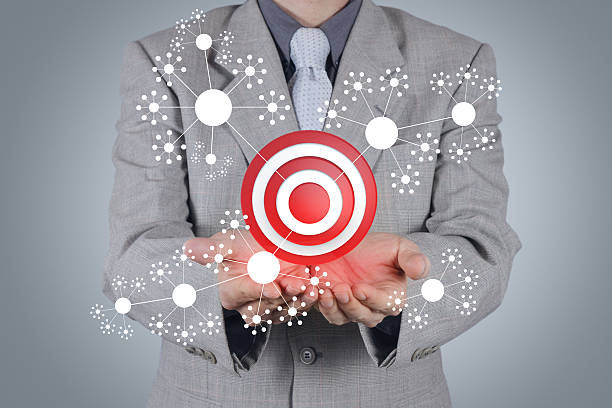 istock businessman hand shows target symbol as concept 180236260