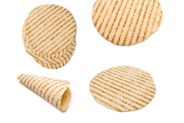 Grilled pitta bread isolated on white background. Grilled pitta bread isolated on white background. Top view. pita bread isolated stock pictures, royalty-free photos & images