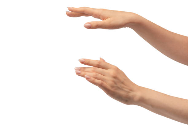 istock Hand of a woman hold some tiny or thin object, isolated. 1802375124