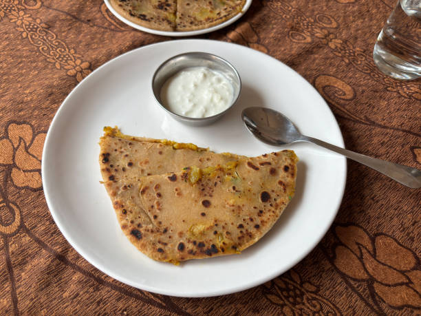 istock Aloo Paratha / Indian Potato stuffed Flatbread. 1802376717