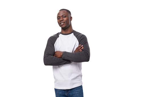 young smiling happy businessman american man dressed casual on studio background.