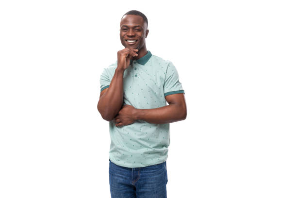 istock young handsome smiling african man dressed casually on studio background 1802384495