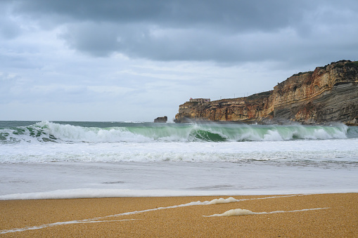 Nazaré is a picturesque coastal town in Portugal, known for its beautiful beaches and as a popular destination for surfers seeking giant waves.