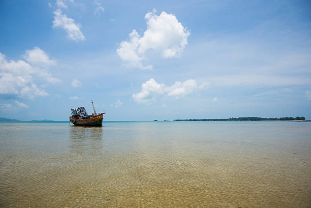 istock Old boat park at Koh Mak, Thailand 180238716