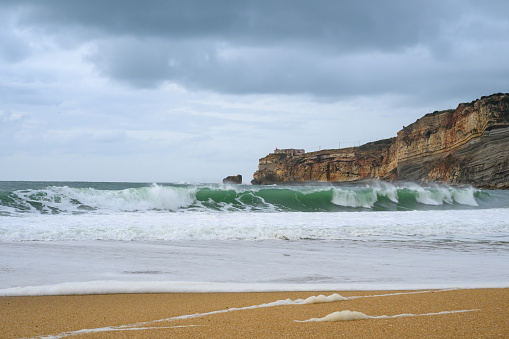 Nazaré is a picturesque coastal town in Portugal, known for its beautiful beaches and as a popular destination for surfers seeking giant waves.