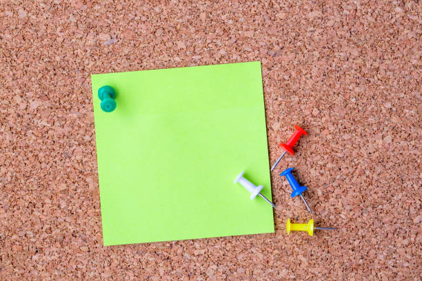 istock Collection of various note papers on corkboard 1802392324