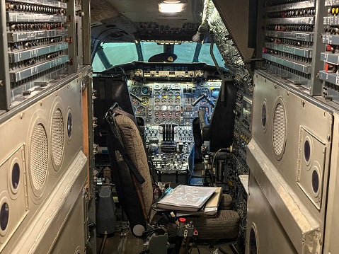 Cambridge, United Kingdom - October 14th, 2023 ;  The cockpit interior of an Aerospatiale/BAC Concorde supersonic aircraft.  Concorde first flew in 1969 before entering commercial service in 1976 before being retired in 2003.