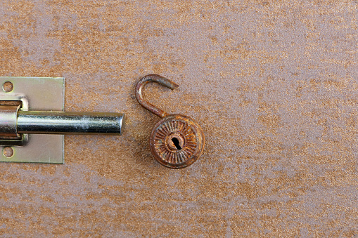 old rusty lock on the background