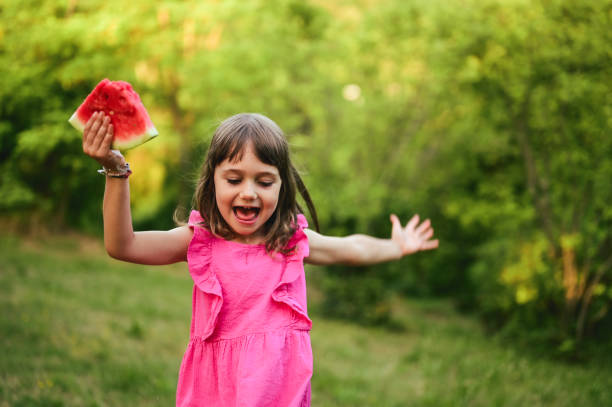 istock Joyful child having fun in summer time. 1802437093