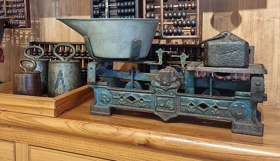 Jakarta, Indonesia - Nov 15, 2023: Well preserved blue color traditional kitchen scales