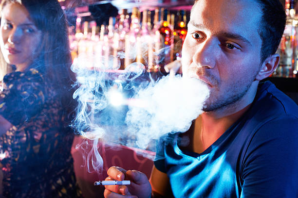 istock Man smoking and exhaling plume of smoke 180244885