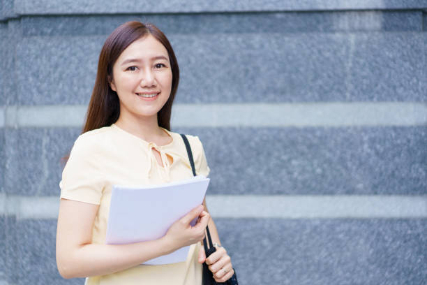 istock Asian woman student portrait on campus. 1802466678