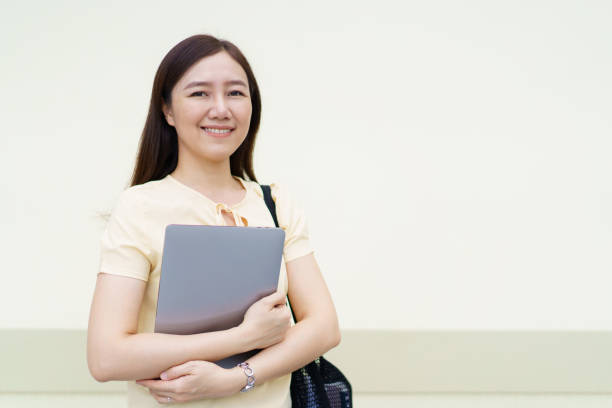 istock Asian woman student portrait on campus. 1802467198