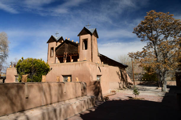 Chimayo NM, USA - Nov 18, 2023: The Sanctuario de Chimayo Church is a Catholic Church and an important Historic Building. The building is made from wood and Adobe Brick with Adobe mortar and plaster. It was built 1816.