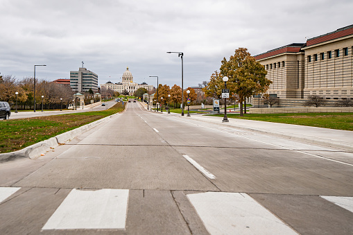 View of the road leading up to the Minnesota State Captiol building in St. Paul on a cloudy fall day