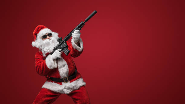 istock Santa Claus with Toy Machine Gun 1802483916