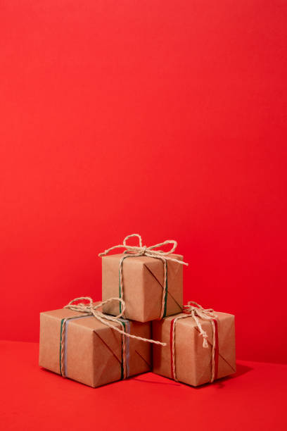 istock Christmas Gifts on Red Background 1802485519