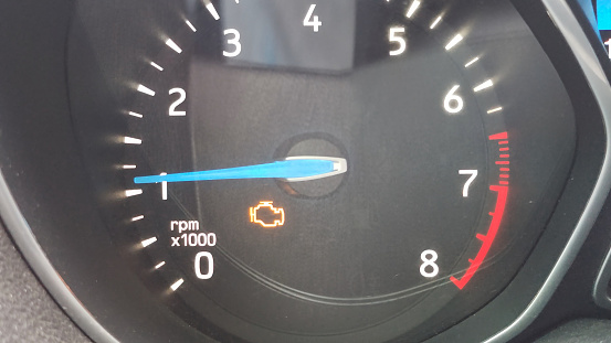 yellow engine icon on car instruments.