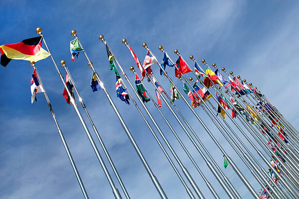 istock Different countries flags united together against blue sky 180249704