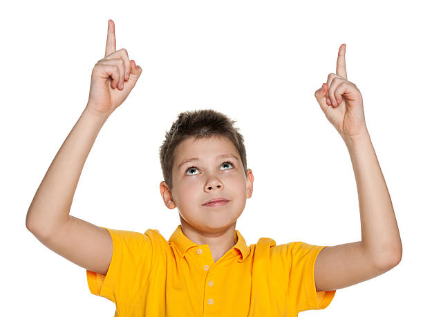 istock Smiling boy showing his fingers up 180249850