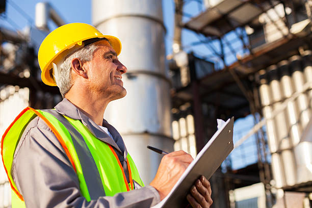 istock mid age petroleum factory worker 180250181