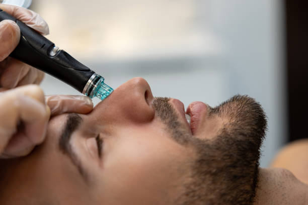 istock Man having cosmetological procedures in a beauty clinic 1802509398