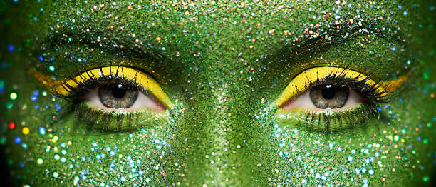 istock Beautiful female eyes with sparkles on her face 1802511069