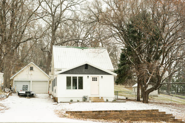 istock Tiny house on a snowy day, Minnesota 1802529381