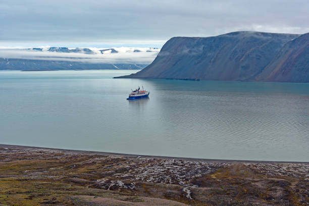 istock Exploration Vessel in a High Arctic Fjord 1802559277