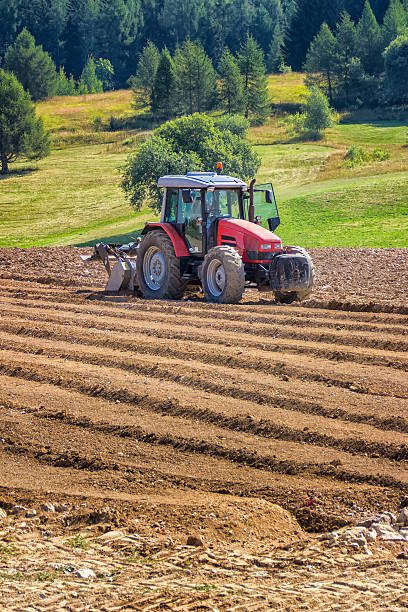 Tractor in a Field stock photo