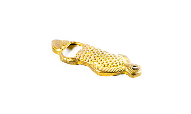 istock golden fish bottle opener isolated 180256131
