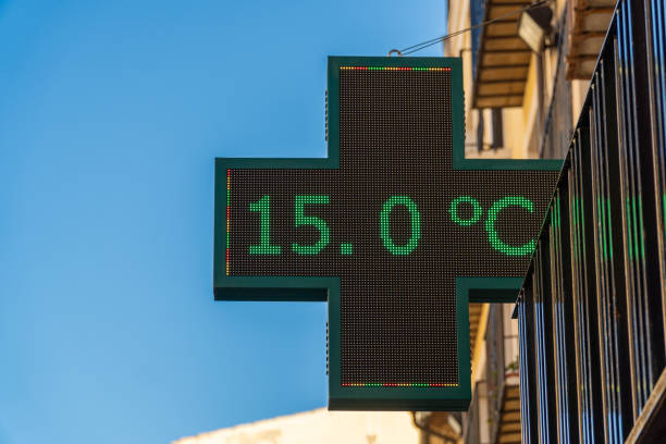 istock Illuminated sign in a pharmacy, informing about the temperature 1802568747