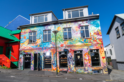 Reykjavik, Iceland - July 10, 2023: Outside the brighly painted Braud and Company bread bakery in downtown area
