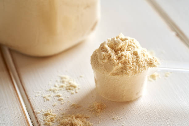 istock A scoop of whey protein powder on a white table 1802590802