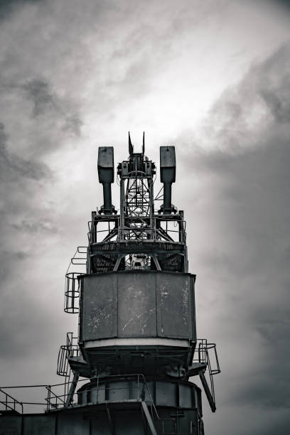 istock an industrial crane at the harbor with a view from below 1802591380