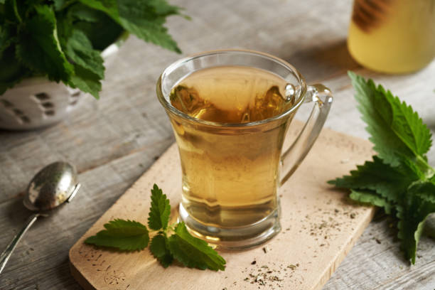 istock Nettle tea in a glass cup 1802594136
