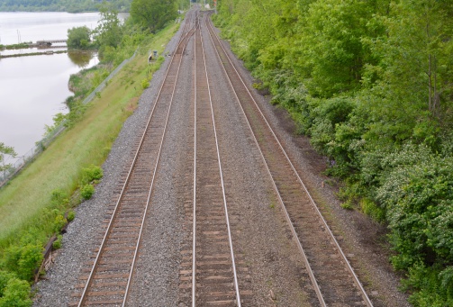 Railroad junction with a level crossing near a small town