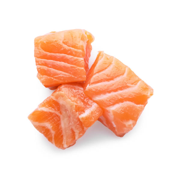 istock Pieces of fresh raw salmon on white background, top view 1802639938