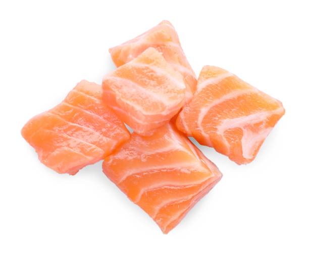 istock Pieces of fresh raw salmon on white background, top view 1802639959