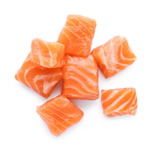 istock Pieces of fresh raw salmon on white background, top view 1802640491