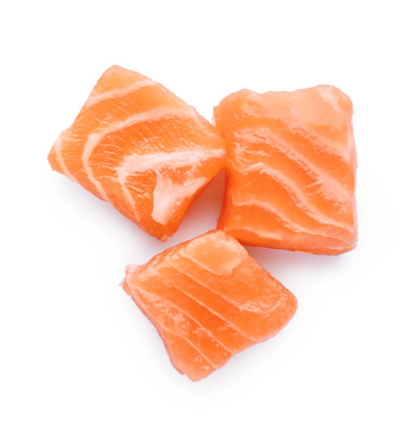 istock Pieces of fresh raw salmon on white background, top view 1802641018