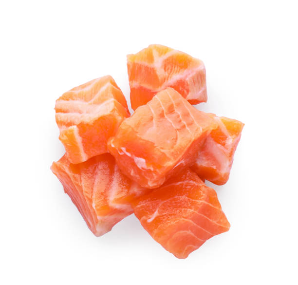 istock Pieces of fresh raw salmon on white background, top view 1802641031