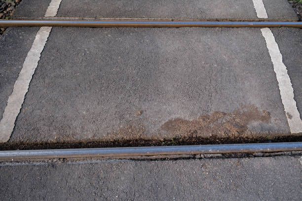 istock Railroad crossing on the road 1802644196
