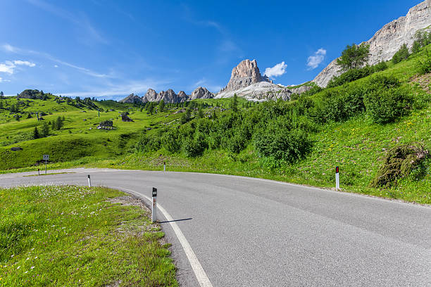 istock Dolomites landscape with mountain road. Italy 180265302