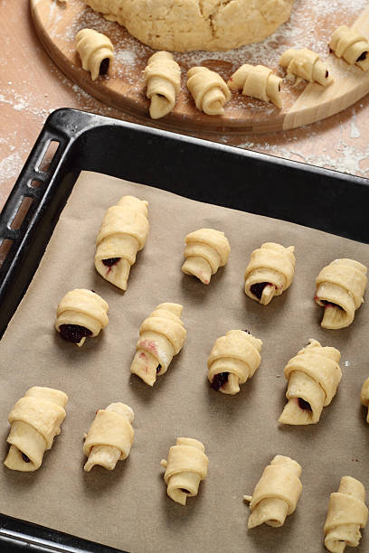 istock Making Croissant Cookies with Jam 180265611
