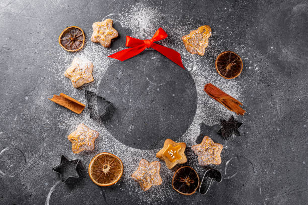 istock Christmas wreath cookies on grey background top view free space for text. Christmas baking background 1802656497