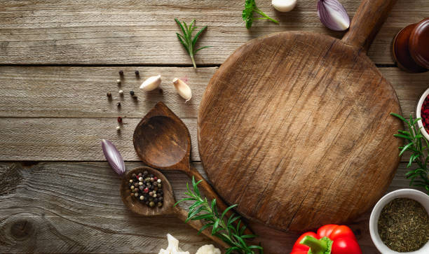 istock Menu background cutting board with spices and ingredients for preparation food top view 1802686096