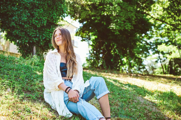 istock Hipster woman relaxing on the ground. 1802688761