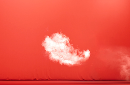 Dry white ice smoke clouds fog empty red stage textured.